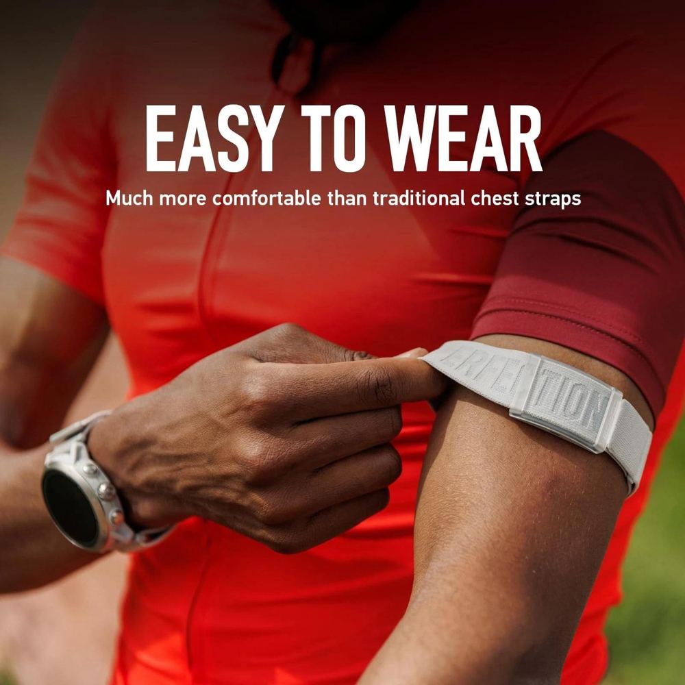 A COROS heart rate monitor with an orange band