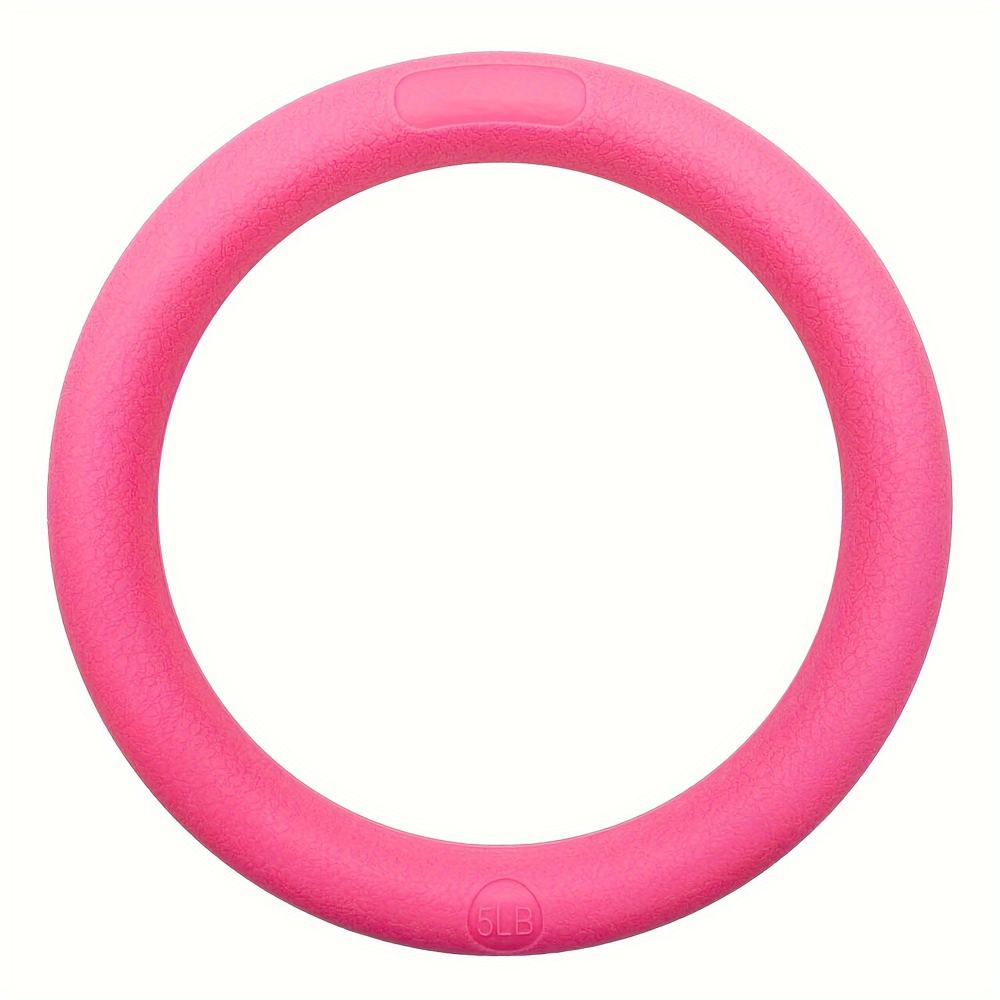 A weighted yoga power ring used for Pilates-style inner-thigh and pelvic floor accessory work